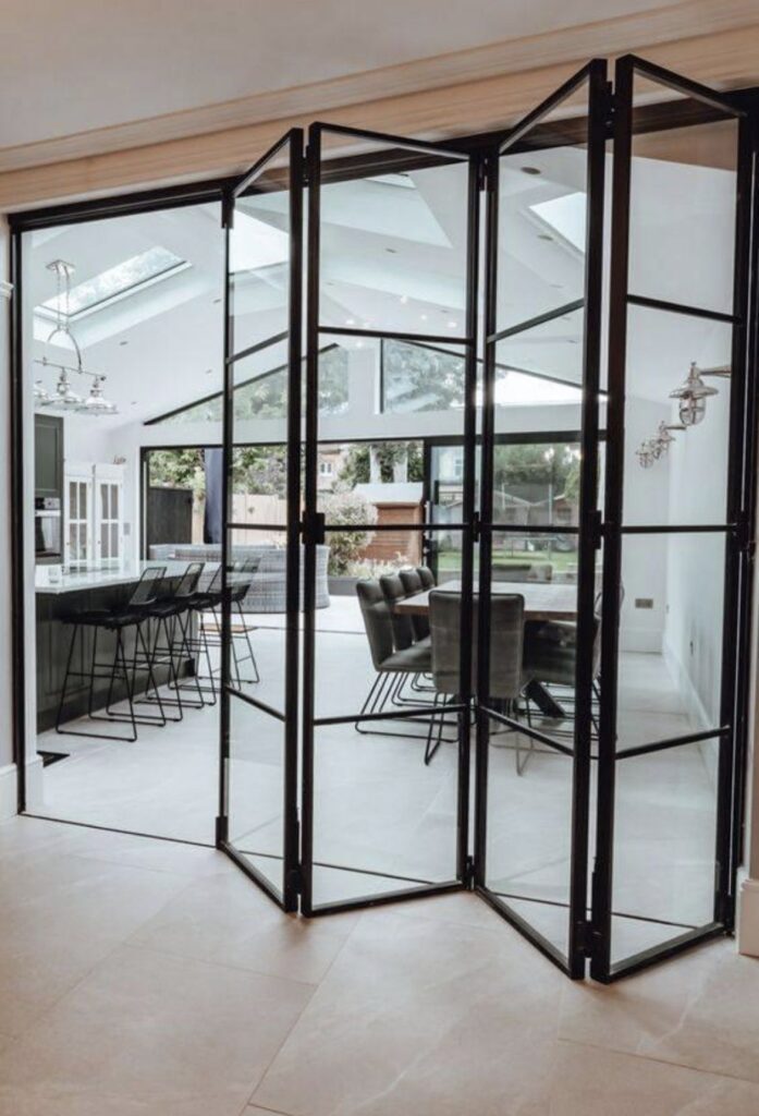 Custom Bi-Fold Door Installation Victor ID creating flexible and open living spaces.